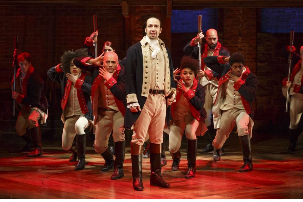 Lin-Manuel Miranda (centre) performs in the musical Hamilton. Photo: AP