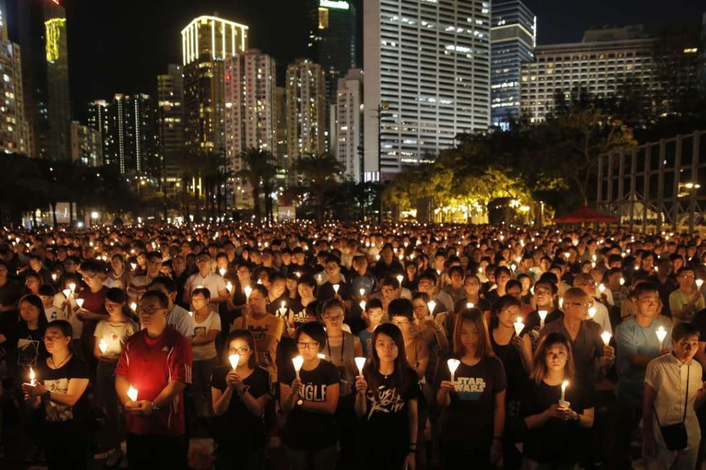 Tens of thousands attend a candlelight vigil at Victoria Park to commemorate the June 4 protests. Some student leaders have labelled the vigil organisers’ slogan of “building a democratic China” a “utopian goal” that was impossible to achieve and criticised its mourning activities as being “ritualistic”. Photo: AP