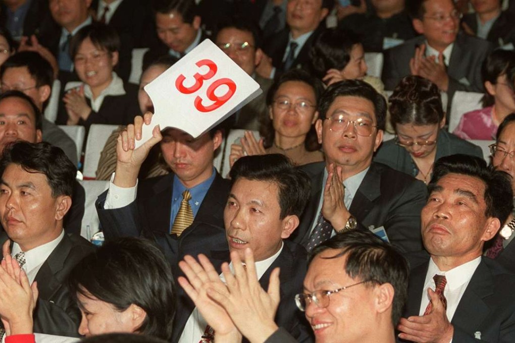 A public land auction in Shenzhen. SOEs are coming under scrutiny for paying vastly inflated prices to win valuable chunks of prime land. Photo: Ricky Chung, SCMP