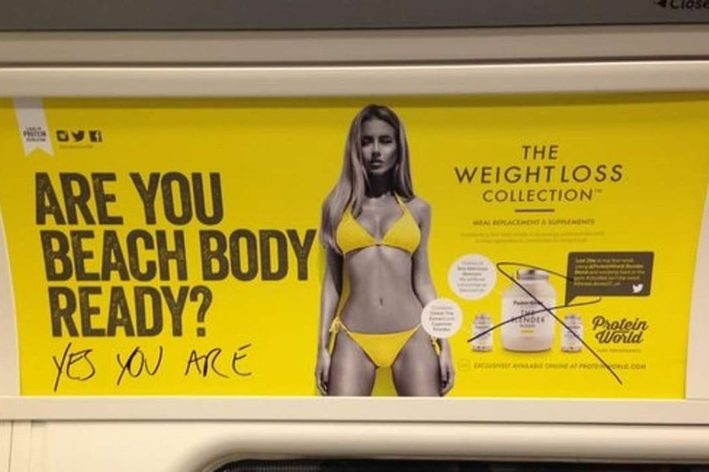 An advertisement for Protein World that sparked a “body shaming” furore is seen defaced on the London Tube. Photo: Twitter