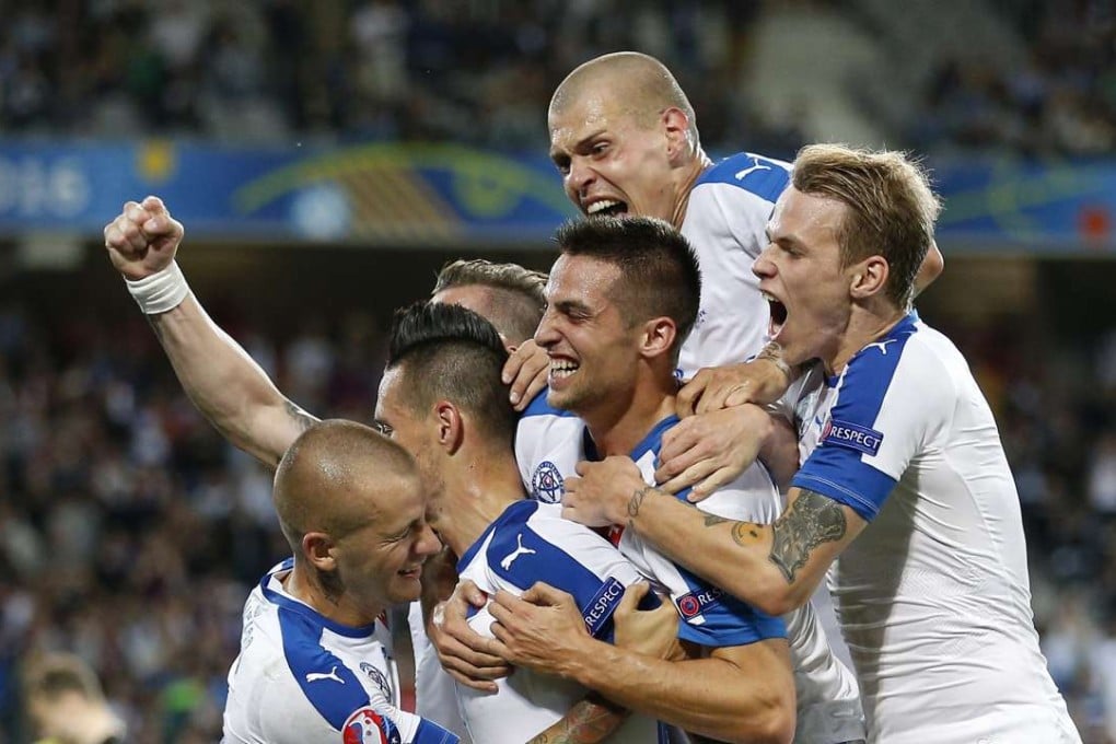 Slovakia players celebrate after Marek Hamsik (2-L) scored EPA/LAURENT DUBRULE EDITORIAL USE ONLY
