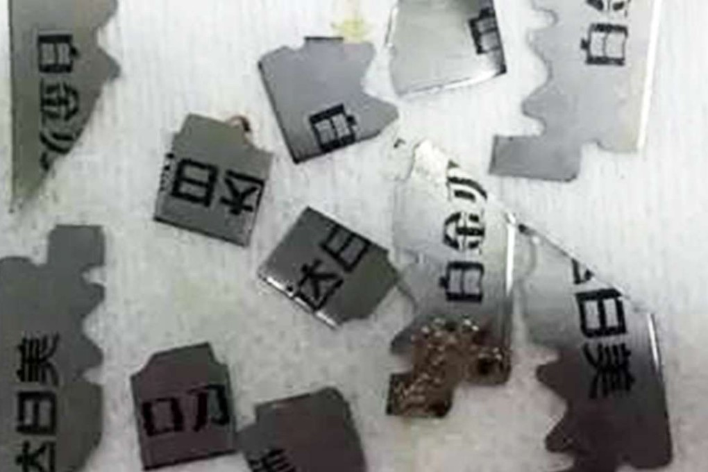 Fragments of the razor blades that doctors removed from the stomach of a Vietnamese expectant mother, who swalloêwed them after a row with her Chinese husband’s parents. Photo: SCMP Pictures