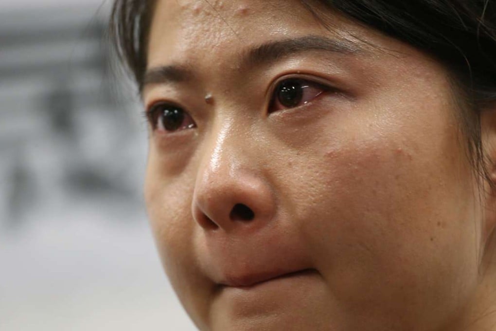 Geng Ge, daughter of Gao Zhisheng, attends the launch of her father’s book at the Legco Building in Tamar. Photo: K. Y. Cheng
