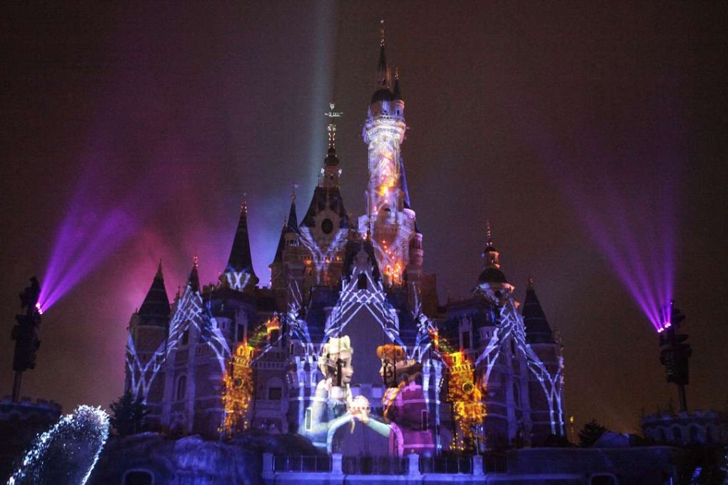 Animated characters are projected onto the Enchanted Storybook Castle at the Shanghai Disney Resort in Shanghai. Photo: AP