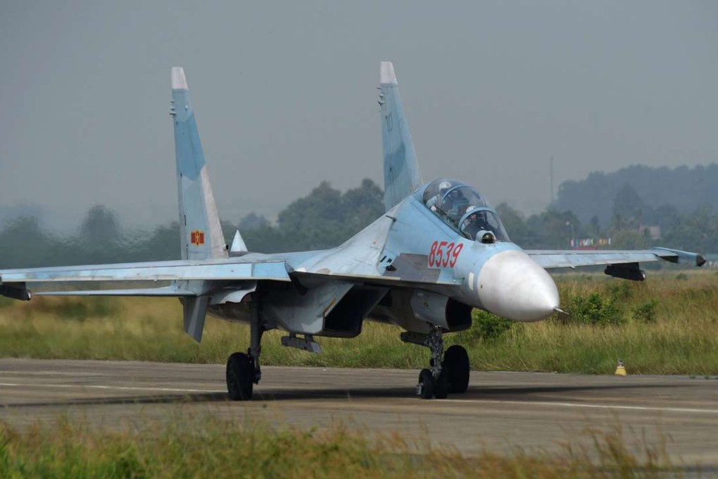 a Vietnam Air Force Sukhoi Su-30MK2 multirole fighter aircraft, similar to the jet fighter that disappeared off the Vietnamese coast on June 14, 2016, taxiing before taking off for a training mission at Bien Hoa military airport in the southern province of Dong Nai. Photo: AFP