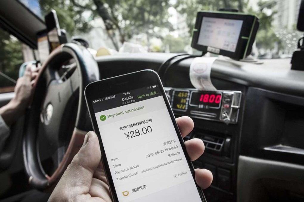 The payment confirmation page is displayed on the Didi Chuxing application in this arranged photograph taken in Shanghai, China, on May 22, 2016. Photo: Bloomberg