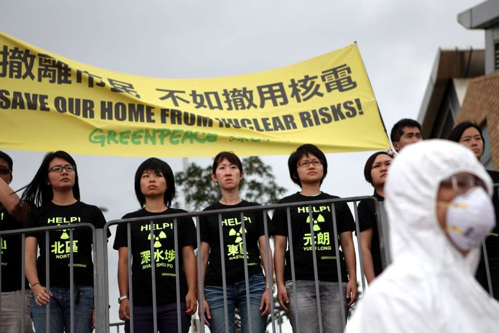 Greenpeace activists stage a protest in Hong Kong against the Daya Bay nuclear power plant. Photo: Corbis
