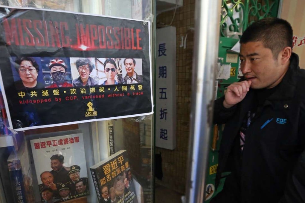 A “missing” poster taped to a window at Causeway Bay Books in Lockhart Road. Photo: K. Y. Cheng