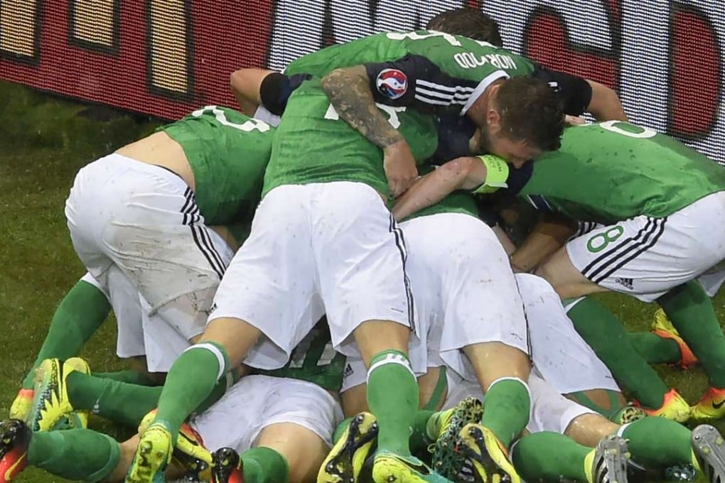 Northern Ireland players celebrate AFP