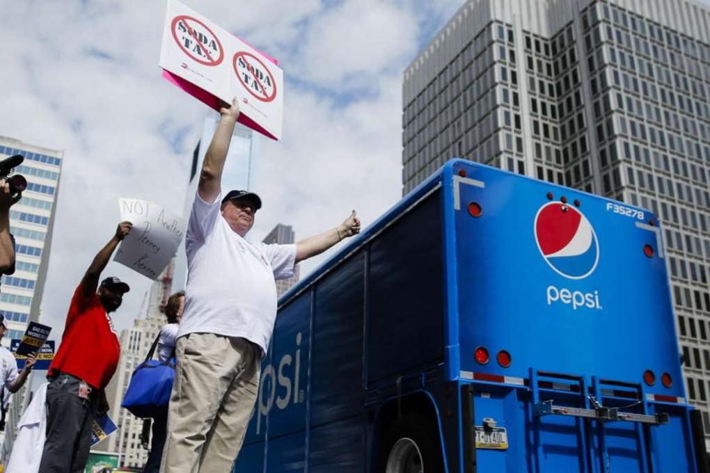 Opponents of a proposed sugary drink tax demonstrate outside City Hall in Philadelphia. Photo: AP