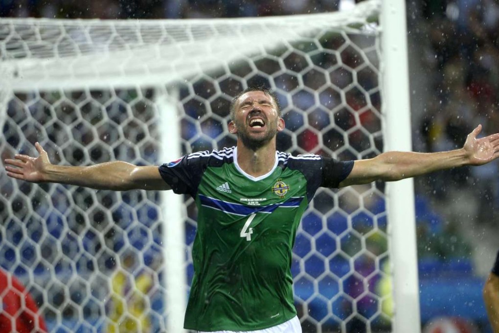 Gareth McAuley of Northern Ireland celebrates after scoring EPA / CJ GUNTHER EDITORIAL USE ONLY