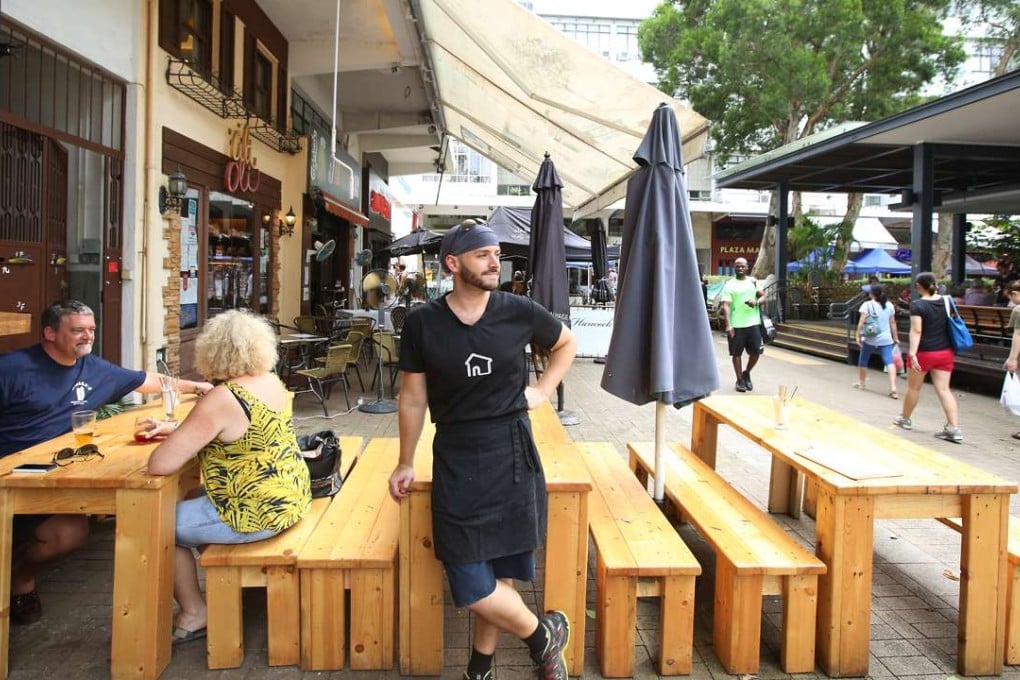 Casa co-owner Nathan Fleck (standing) is far from happy with the regulatory system. Photo: Nora Tam