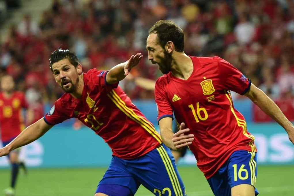 Spain's forward Nolito (L) celebrates his goal AFP PHOTO / BULENT KILIC