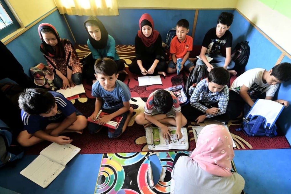 Refugee children at a pioneering school in Cisarua, West Java. Photo: AFP