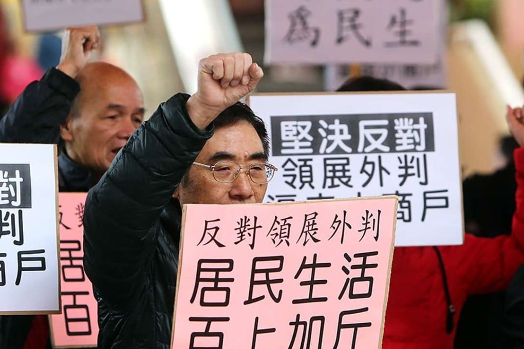 Stall owners at Tsing Yi’s Cheung Fat Market were angered by the decision to outsource the market’s management operations. Photo: Dickson Lee