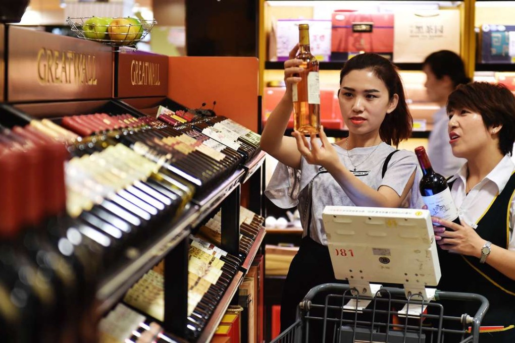 The number of families with disposable monthly income of more than 12,000 yuan in China is expected to hit 100 million by 2020. Photo: Xinhua