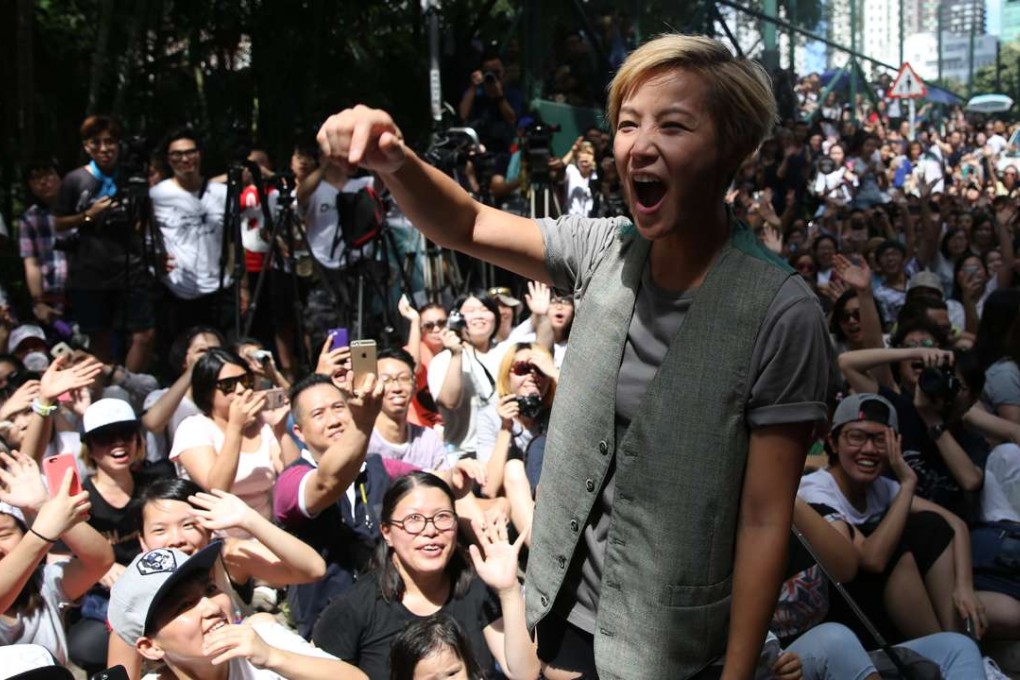 Dennis Ho before her screaming fans at Sheung Wan concert site. Photo: Sam Tsang