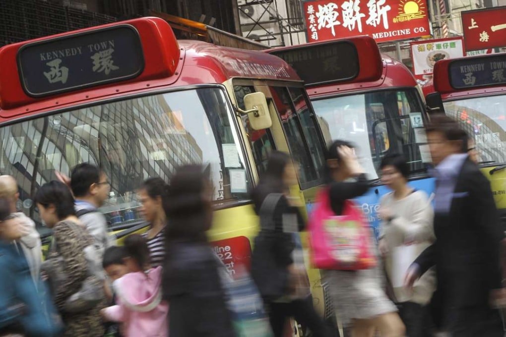 Drivers of red-top minibuses now earn an average of just HK$10,000 a month, down from HK$30,000 four years ago. Photo: David Wong