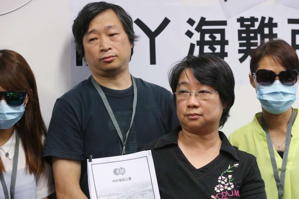 Families of victims in the Lamma ferry tragedy including Irene Koo (second from right) at Legco on Sunday. Photo: Edward Wong