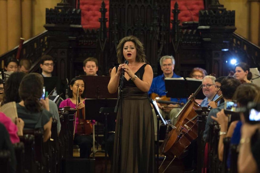 Lubana al-Quntar, a Syrian opera singer, sings with the Refugee Orchestra Project on World Refugee Day. Photo: AFP