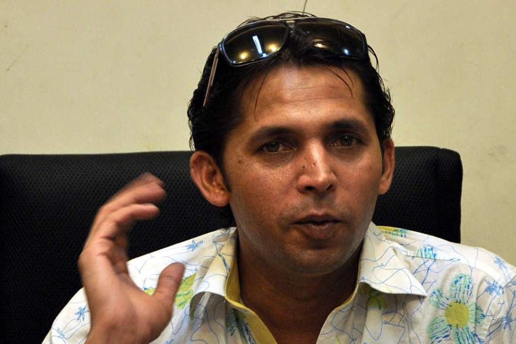 Pakistan cricketer Mohammad Asif speaks during a press conference in Karachi in 2013. Photo: EPA