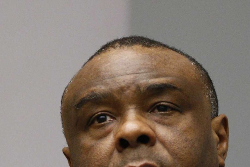 Jean-Pierre Bemba sits in the courtroom of the International Criminal Court in The Hague. Photo: EPA