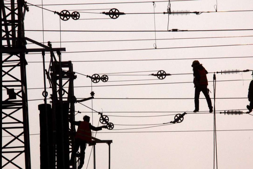Power lines for a new railway line are under construction to boost belt-road connectivity. Photo: Reuters