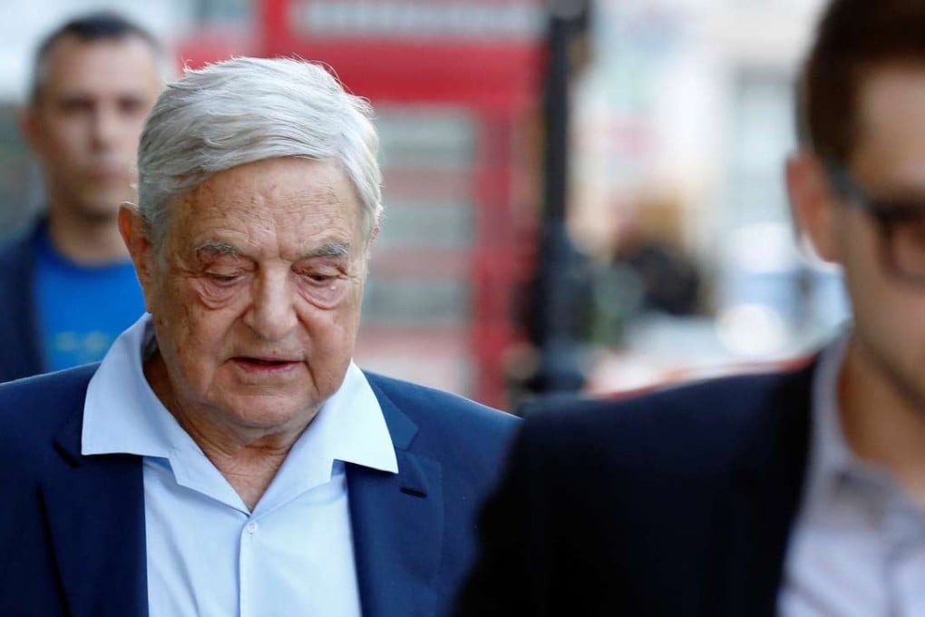 Business magnate George Soros arrives to speak at the Open Russia Club in London on Monday. Photo: Reuters