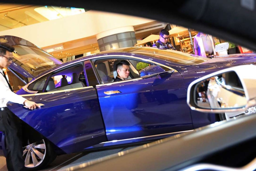 Tesla's updated Model S at its Hong Kong debut. The car has sex appeal and a huge local subsidy. Photo: Nora Tam