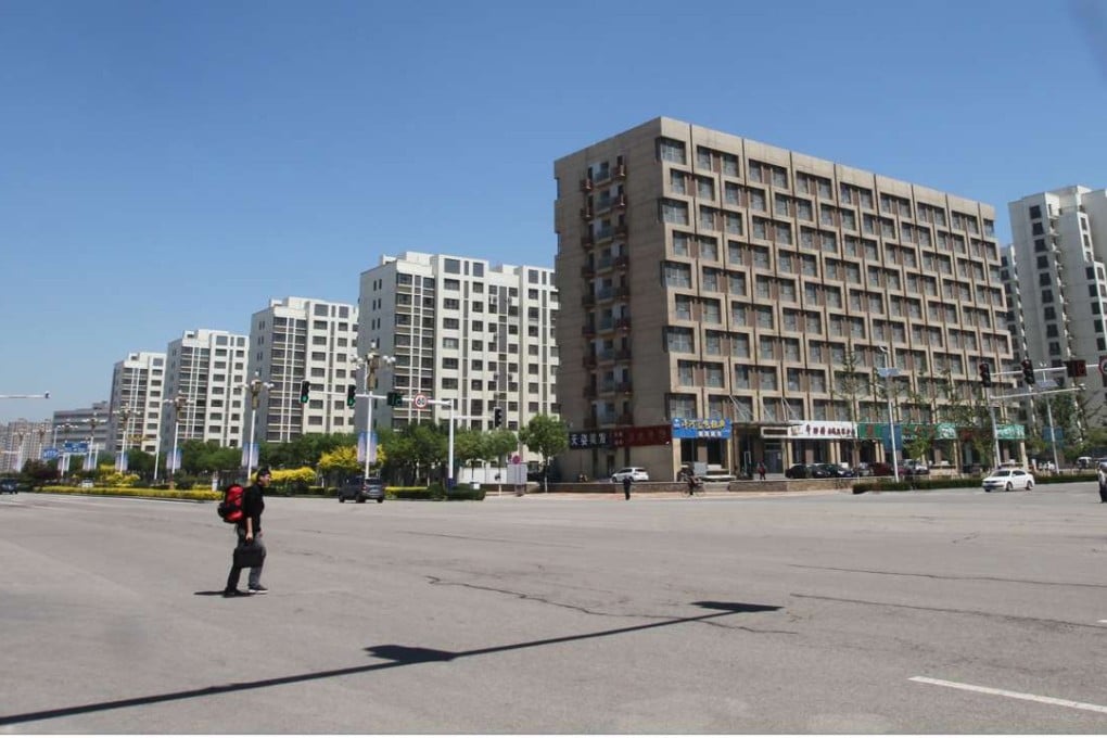 Your’re unlikely to be hit by a car when crossing Caofeidian’s main street. Photo: Simon Song