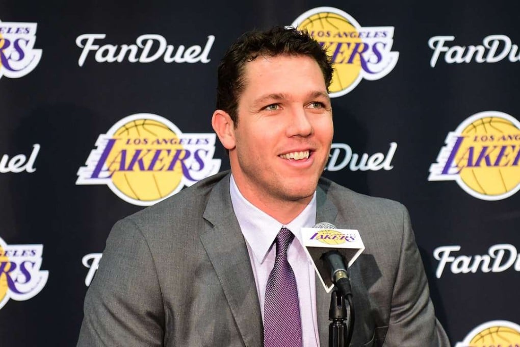 Luke Walton speaks to the press as he is introduced as the 26th Los Angeles Laker head coach. Photo: AFP