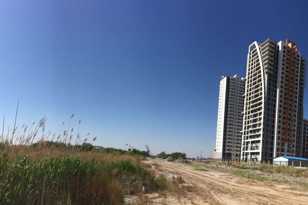 New residential buildings in Caofeidian, an economic development zone in Tangshan built on land reclaimed from Bohai Bay. Photo: Simon Song
