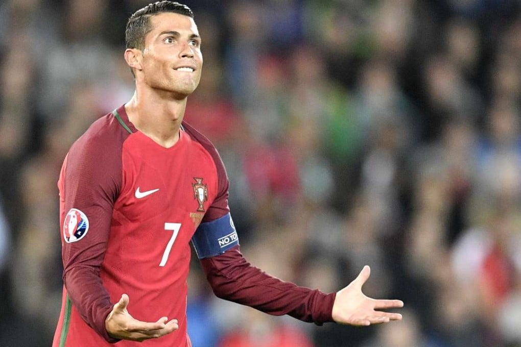 Portugal's Cristiano Ronaldo gestures during the Euro 2016 Group F soccer match between Portugal and Austria . (AP Photo/Martin Meissner)
