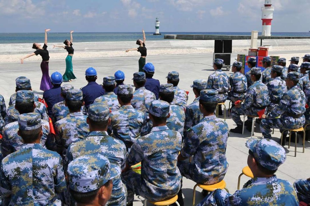 Military performers dance for the workers and military personnel on Huayang Reef on the Spratly Islands in the South China Sea in May. Photo: China News Service
