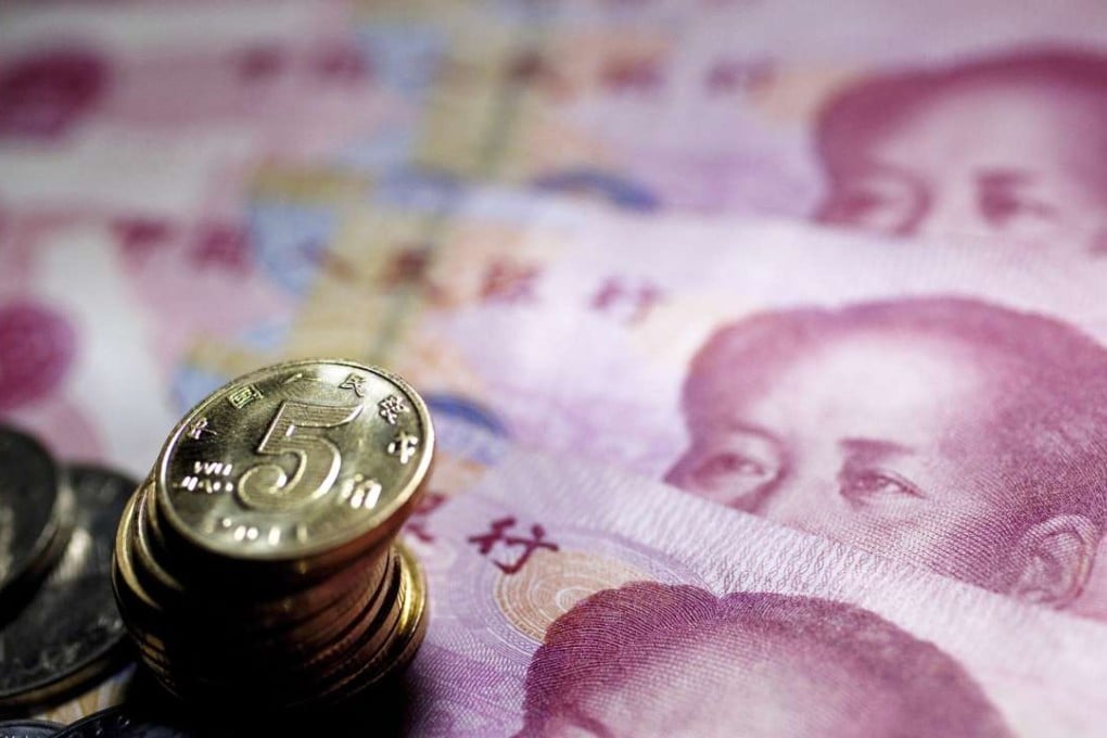 Singapore will include yuan-denominated assets in its official foreign reserves from June. Photo: EPA