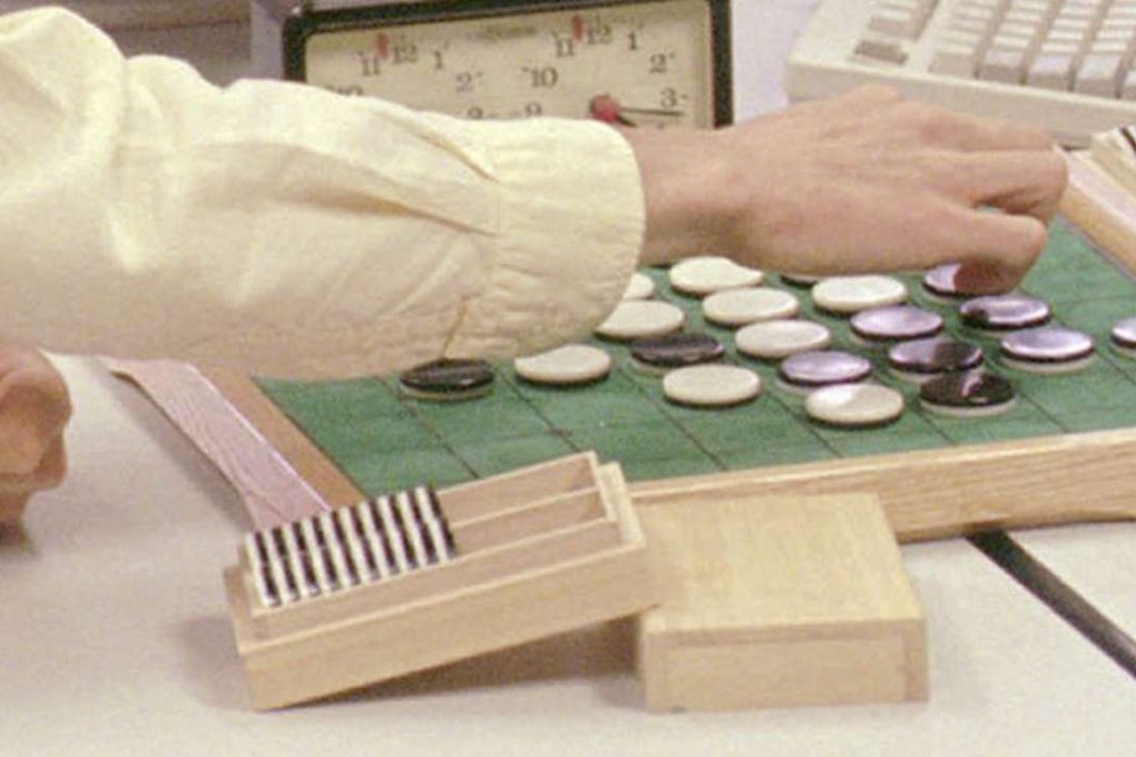 Goro Hasegawa came up with the idea for the board game Othello when he was a child and played with milk bottle tops. Photo: AP