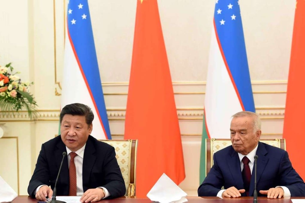 President Xi Jinping (left) pictured with his Uzbek counterpart Islam Karimov at a press conference on Wednesday. Photo: Xinhua
