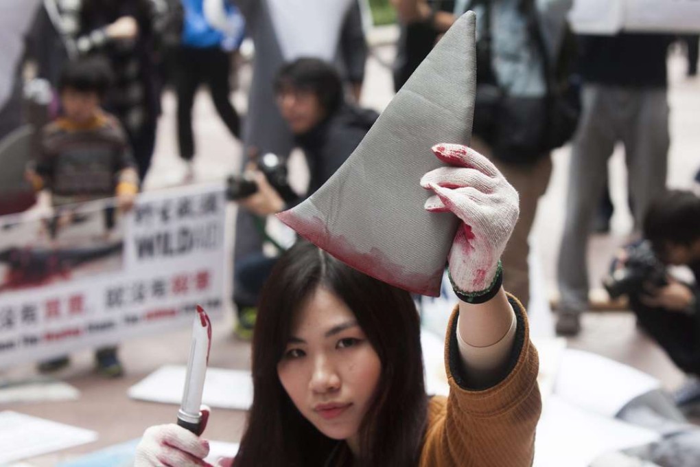Activists in Hong Kong protest against the consumption of shark fin, during a demonstration earlier this year. Photo: EPA