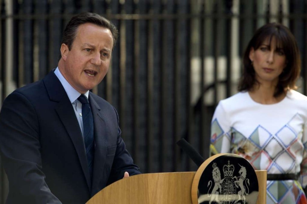 British Prime Minister David Cameron confirms his plan to resign while his wife Samantha watches. Photo: EPA