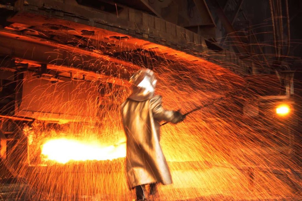 A worker processes nickel at a nickel smelter of PT Vale Tbk, near Sorowako, Sulawesi island, in Indonesia whose ban on exports forced China to turn to the Philippines as the top supplier of the metal for its stainless steel industry. Photo: Reuters