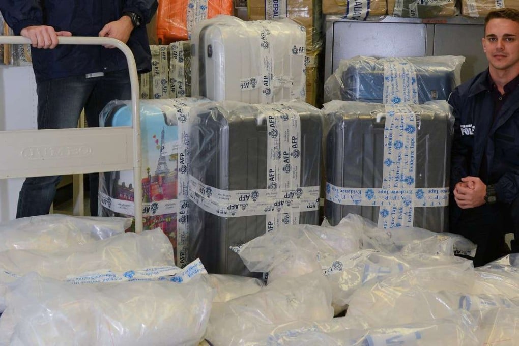 Western Australian Police with the seized packages of crystal meth. Photo: SCMP Pictures