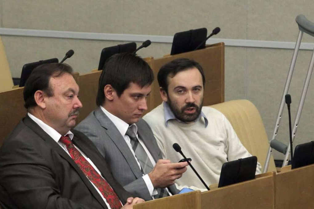 Russia’s opposition lawmaker Dmitry Gudkov (centre) termed the bill as the ‘Big Brother law’. Photo: EPA