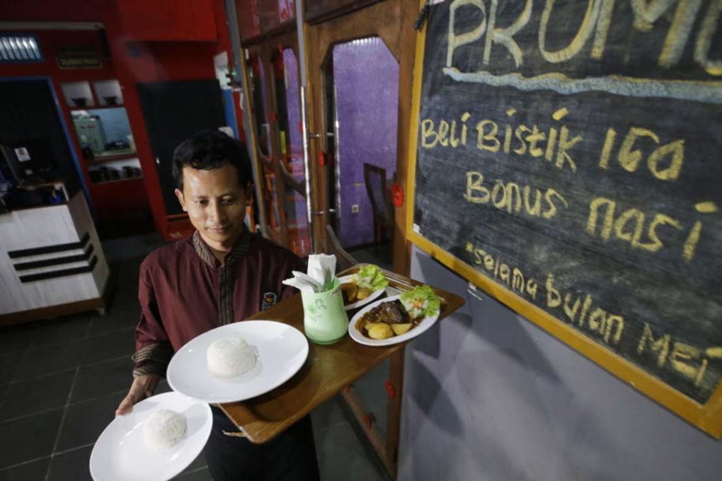 Mahmudi Haryono is a poster boy for the transformation of a jihadi into a productive member of society. Photo: AP