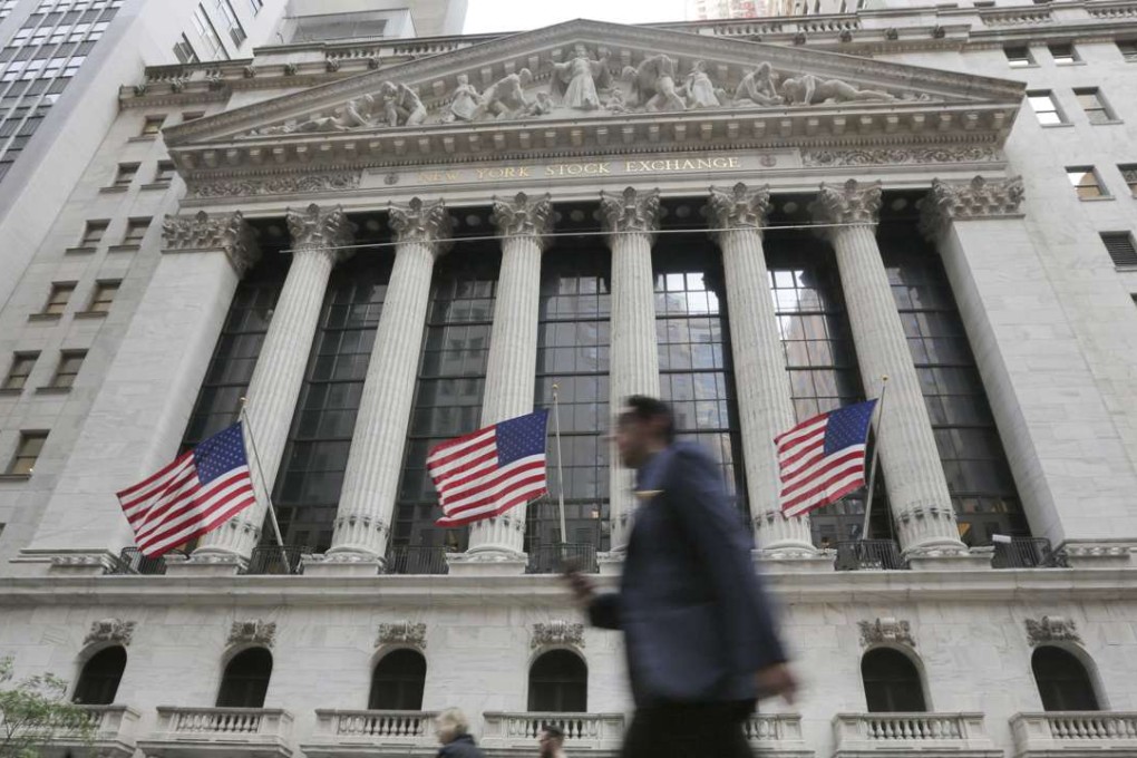 The front of the New York Stock Exchange on Friday. The Brexit sent global markets plunging and the pound to a 31-year low. Photo: Richard Drew, AP