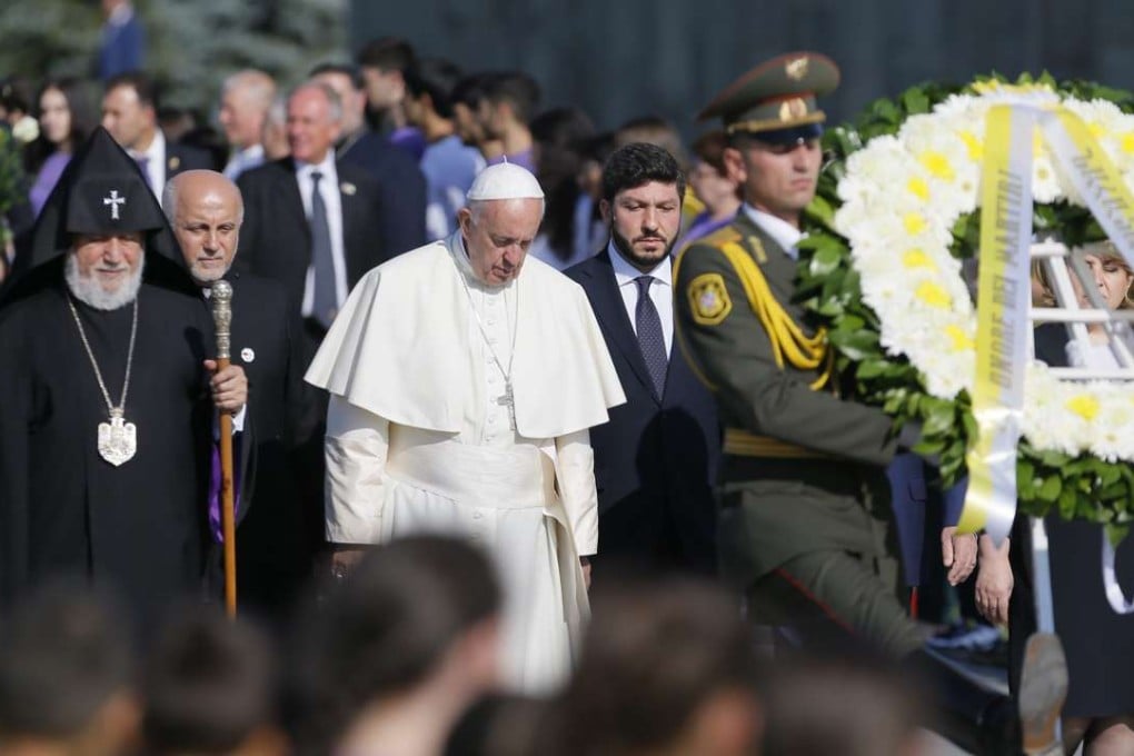 Pope Francis (centre) pays tribute to victims of the Armenian genocide under the Ottoman Empire in Yerevan on Saturday. Photo: EPA