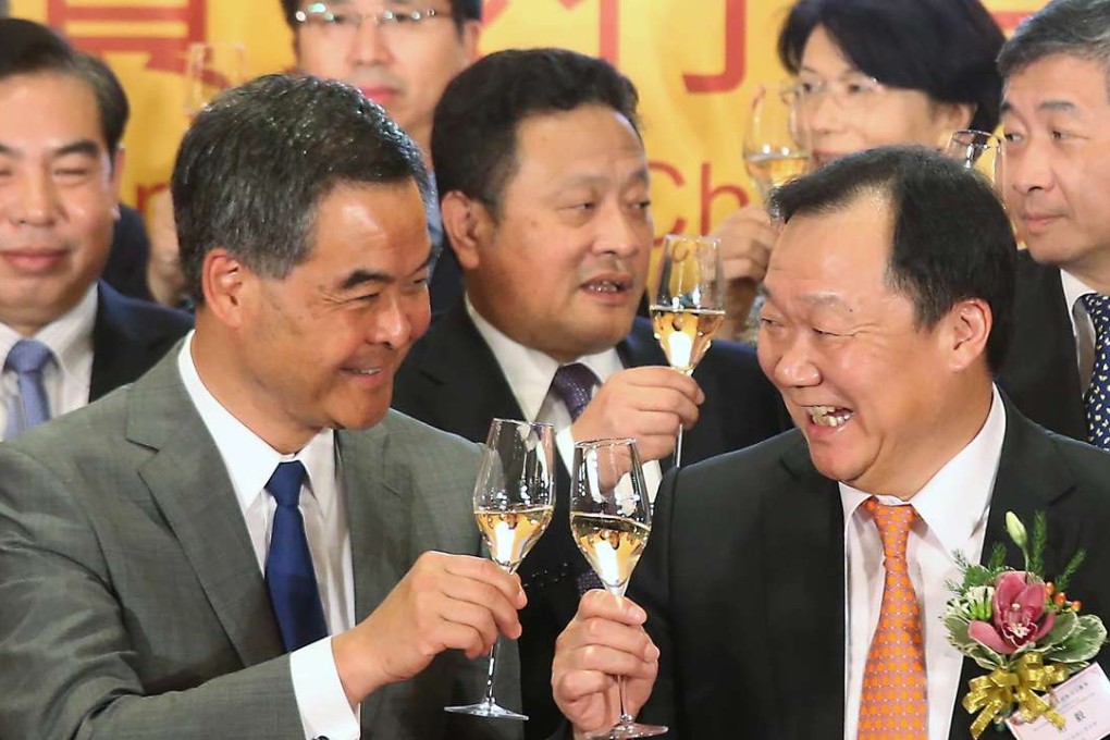 Chief Executive Leung Chun-ying (left) and Chairman of Chinese Banking Association of Hong Kong Yue Yi attend a lauch ceremony at Island Shangri-La in Admiralty on June 27, 2016. Photo: David Wong