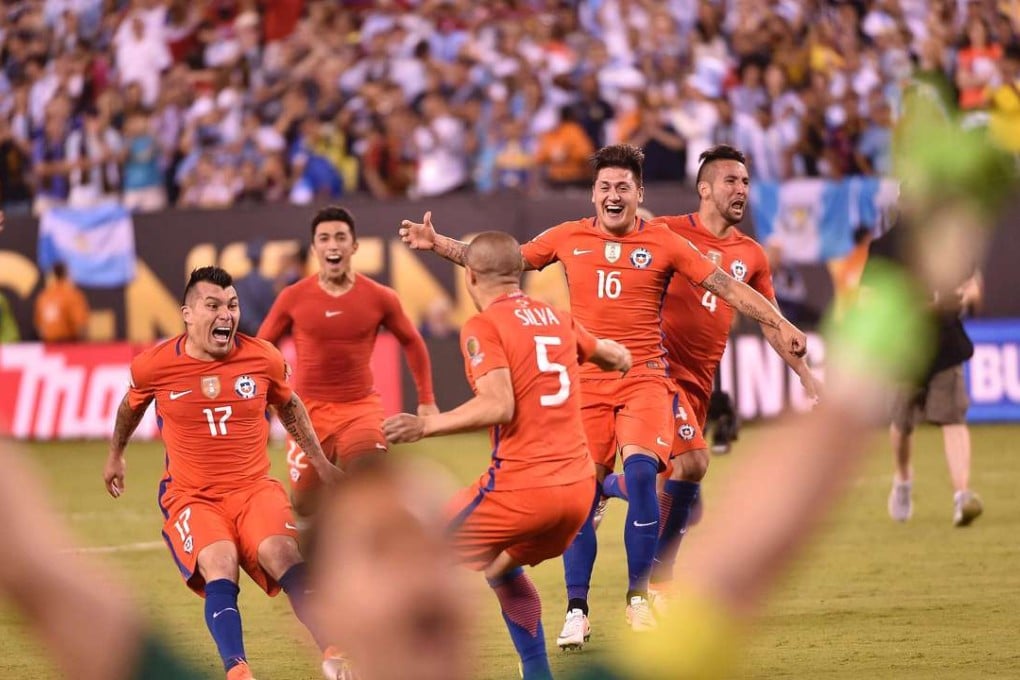 Chile’s players celebrate after defeating Argentina in the penalty shoot-out to win the Copa America Centenario final. Photo: AFP