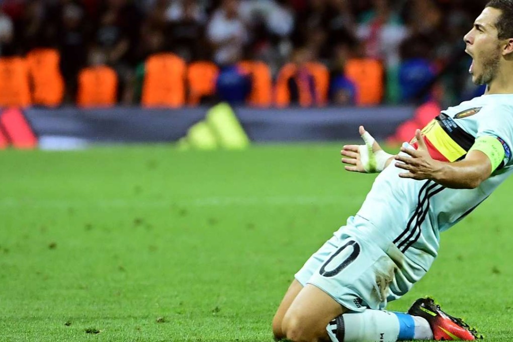 Eden Hazard celebrates AFP PHOTO / EMMANUEL DUNAND