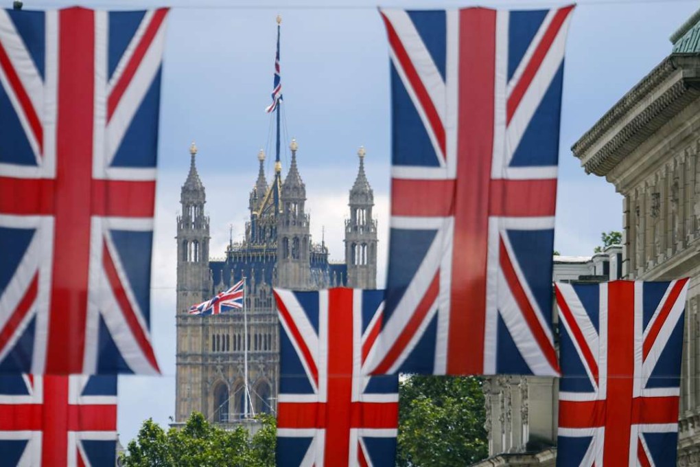 Union flag banners hang near the Houses of Parliament in London after the announcement that the UK had voted to leave the European Union in a national referendum. The result sent shockwaves through global markets. Photo: AFP