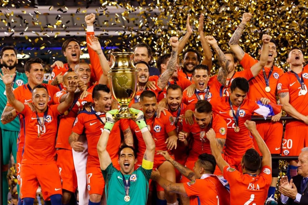 Chile celebrate with the trophy after winning the final of 2016 Copa America Centenario. Photo: Xinhua
